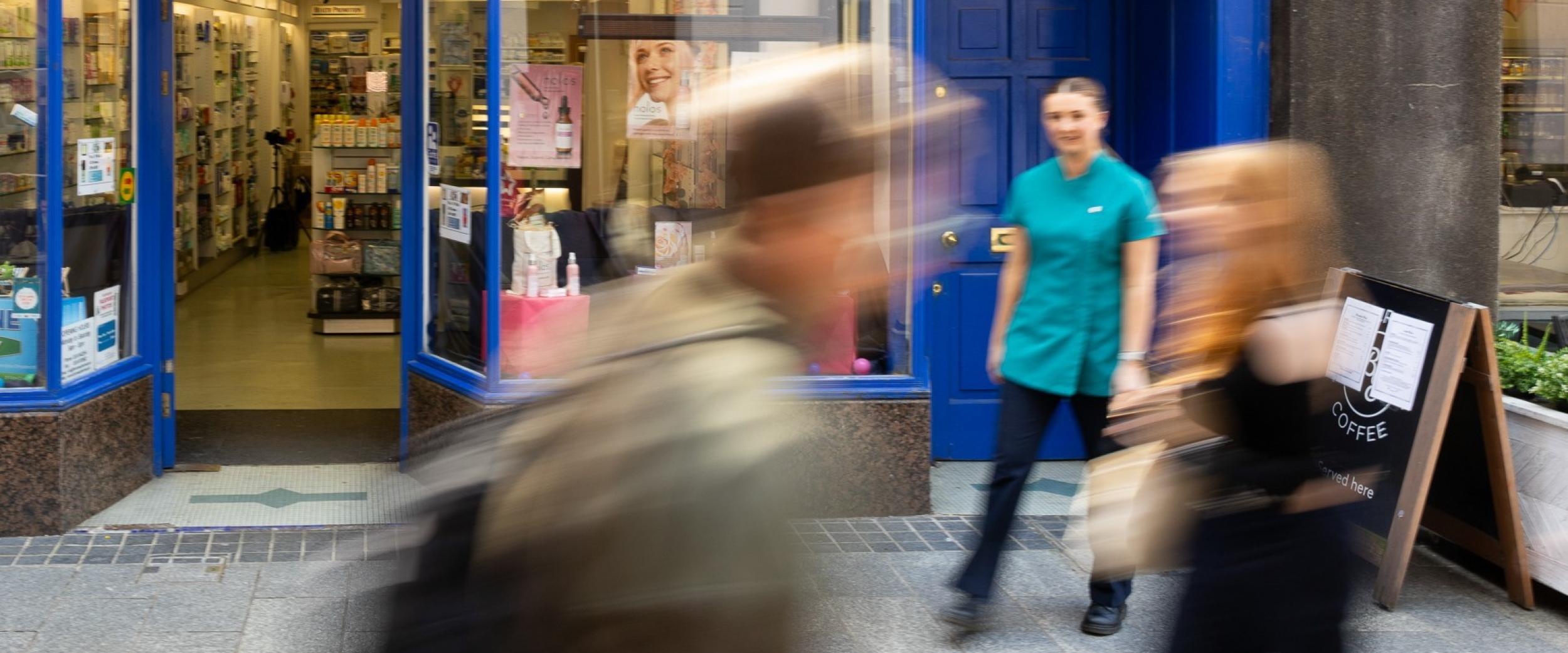 members of the public outside pharmacy