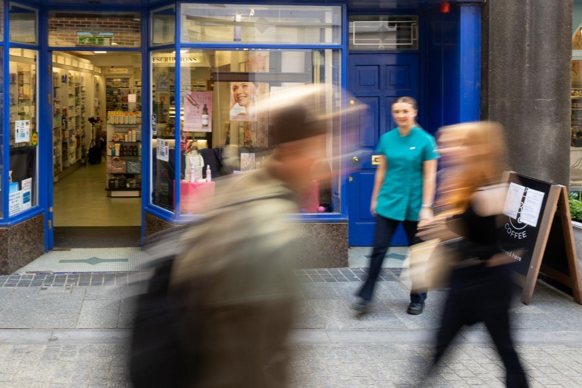 members of the public outside pharmacy